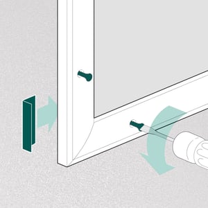 1. Loosen corner screws on the existing door frame.